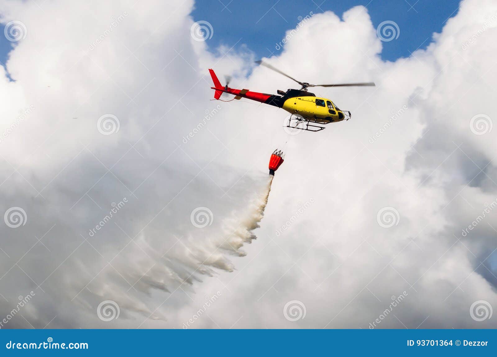 Helicopter Flying in the Sky Pouring Water on Fires. Stock Photo