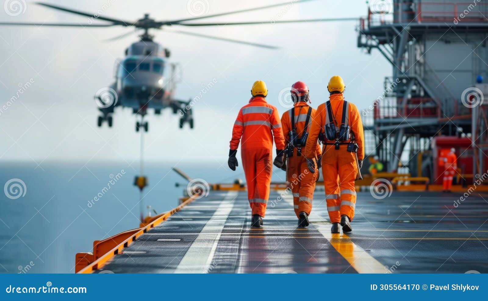 the helicopter landing at oil rig platform