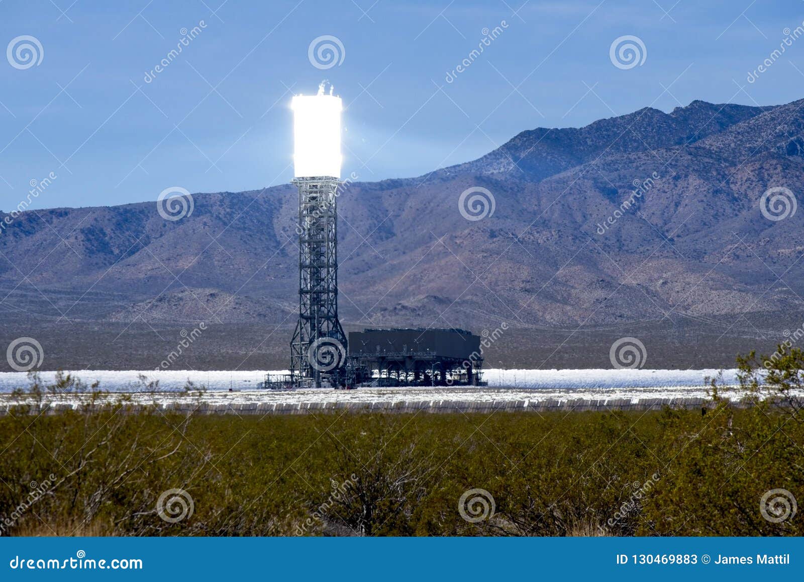 heliostat generating electricity in the desert