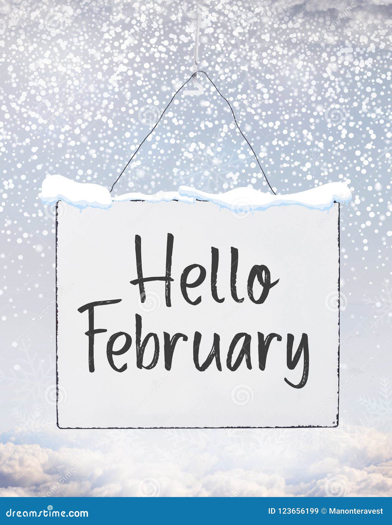 hello february text on white plate board banner with cold snow f