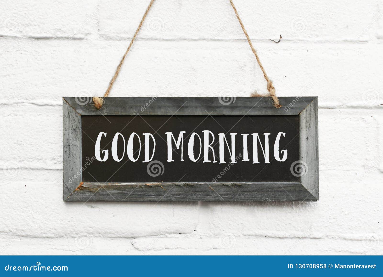Hello Good Morning Text on Long Hanging Blackboard with Wooden F ...