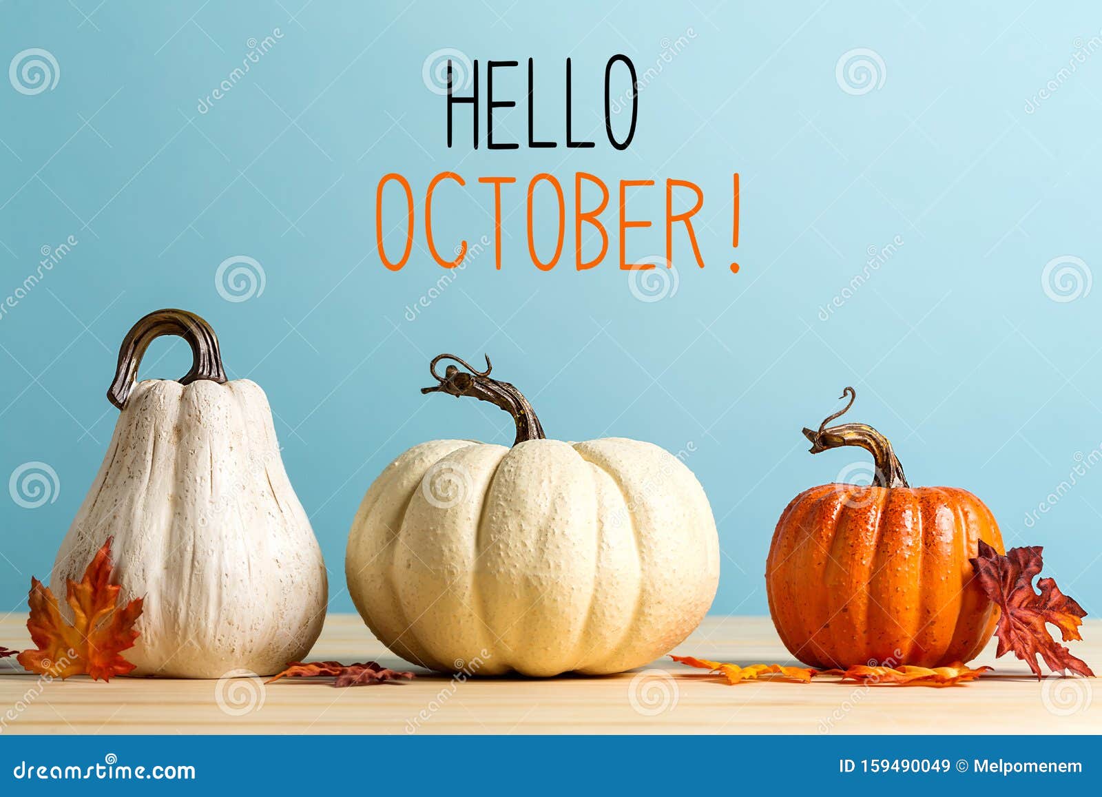 hello october message with pumpkins