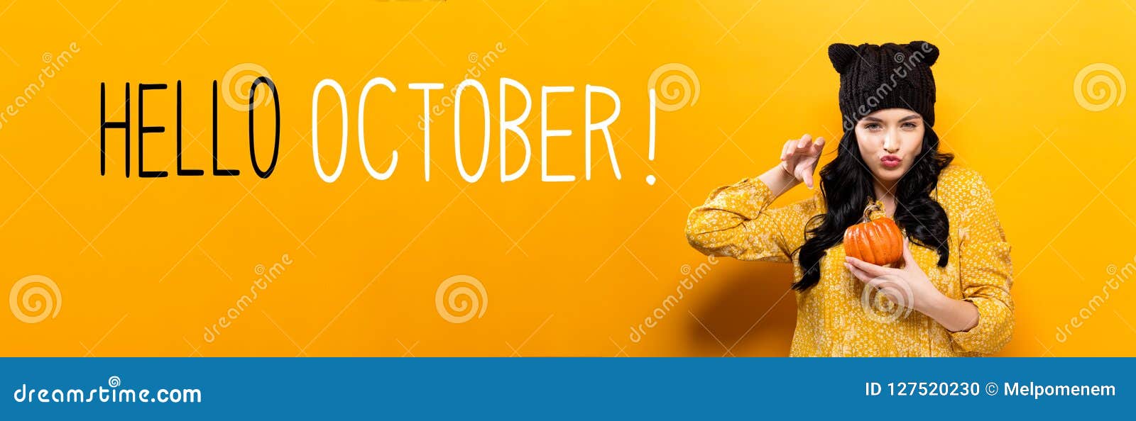 hello october with woman holding a pumpkin
