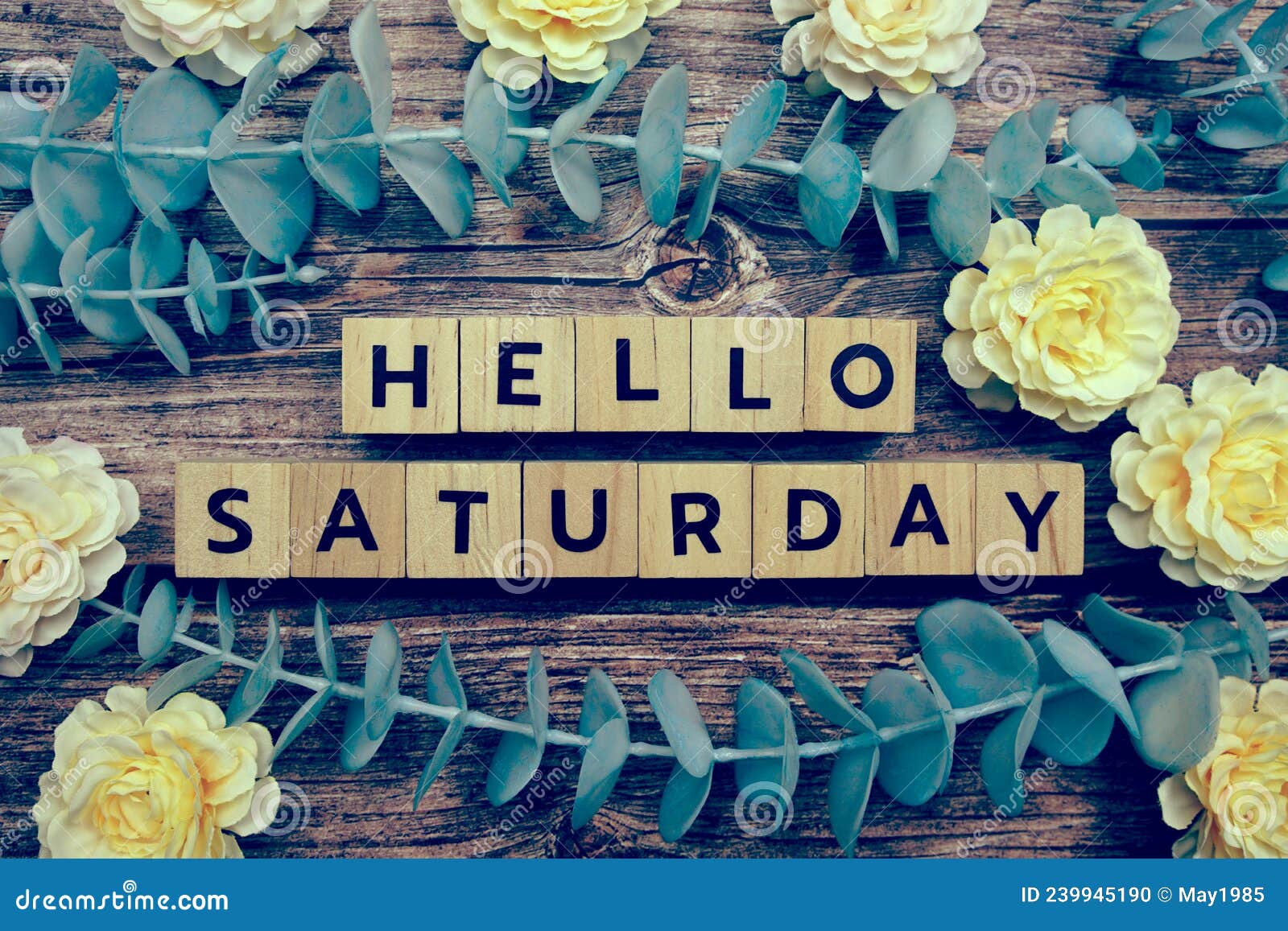 Hello Saturday Alphabet Letter And Flower Decorate On Wooden Background