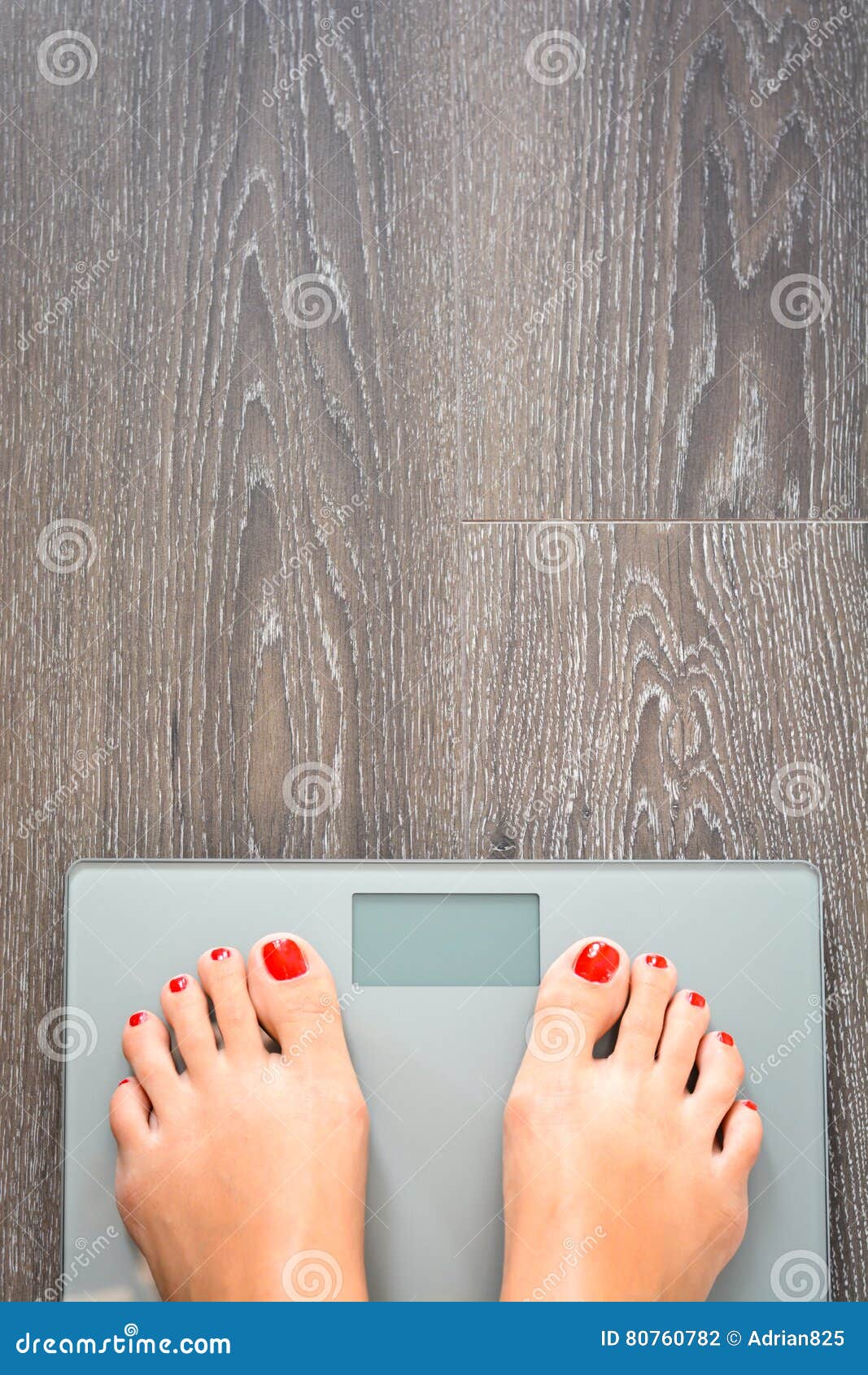 The Feet Of A Woman Standing On Bathroom Scales To Turn Stock Photo,  Picture and Royalty Free Image. Image 11153927.