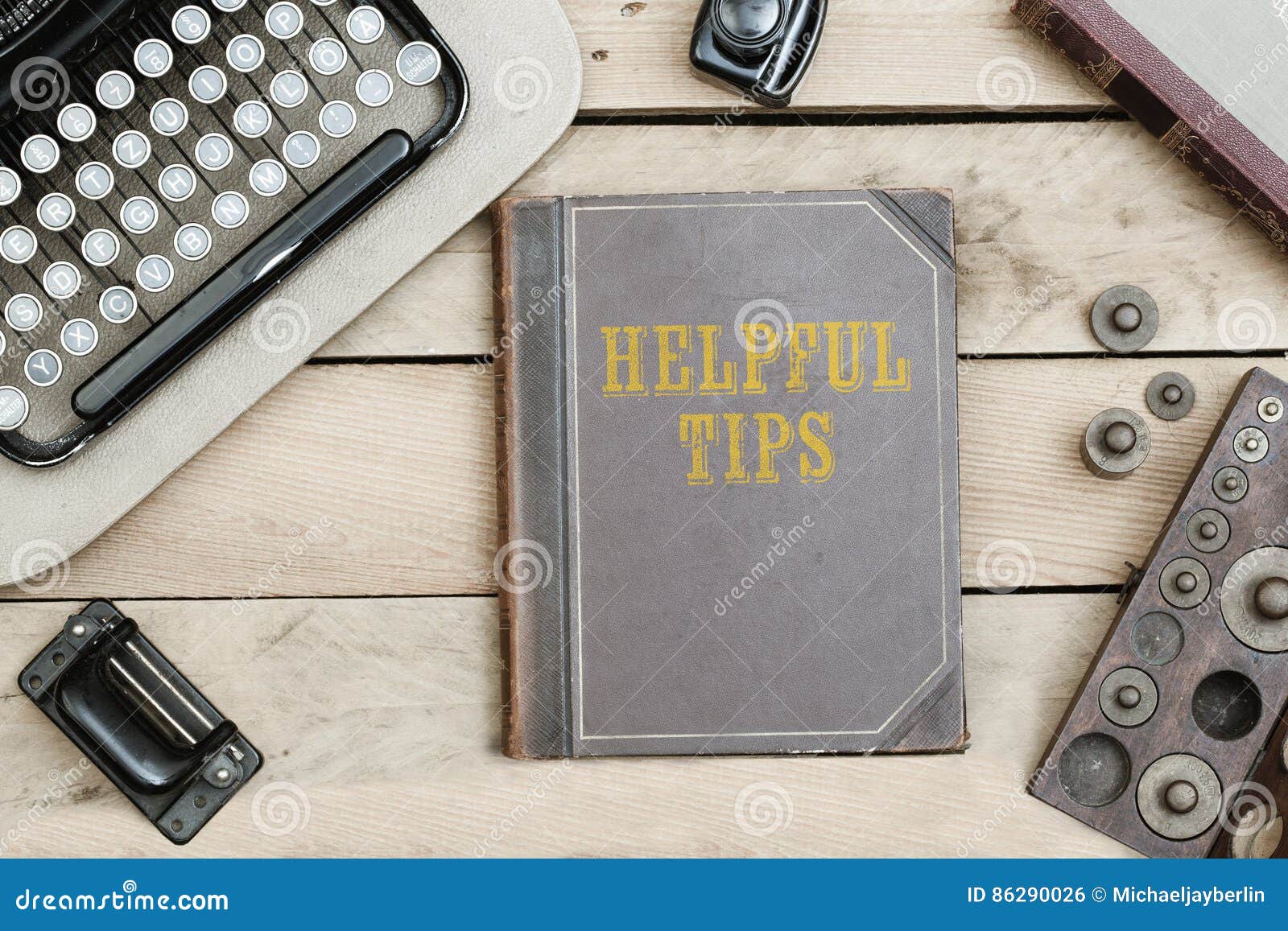 Helpful Tips On Old Book Cover At Office Desk With Vintage Items