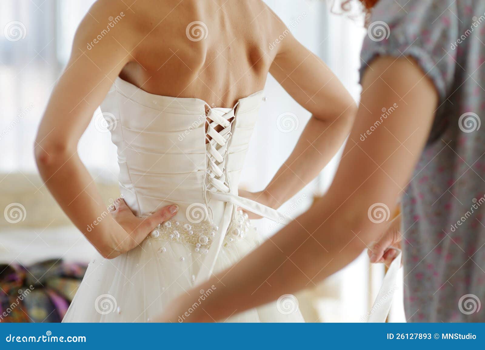 Helping the Bride To Put Her Dress on Stock Image Image of clothing, dress 26127893