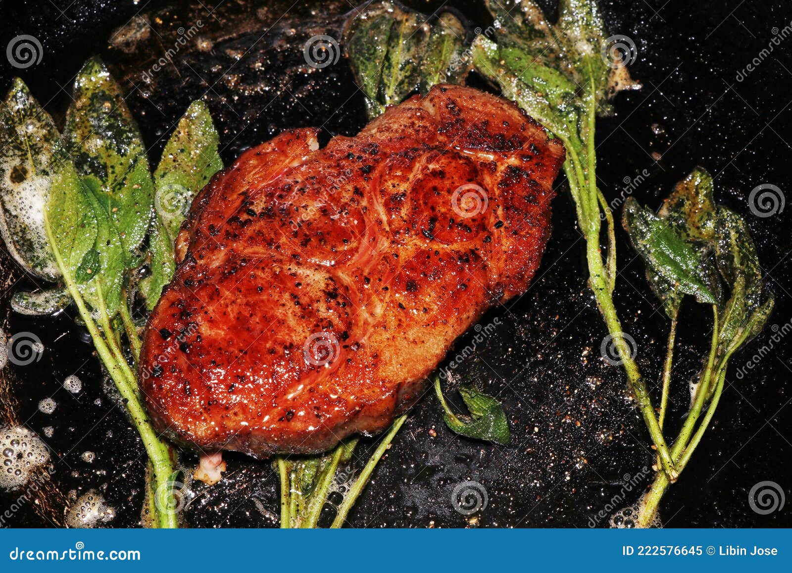Herb Marinated Pork Rib Eye Cooking with Sage with a Hot Griddle Stock