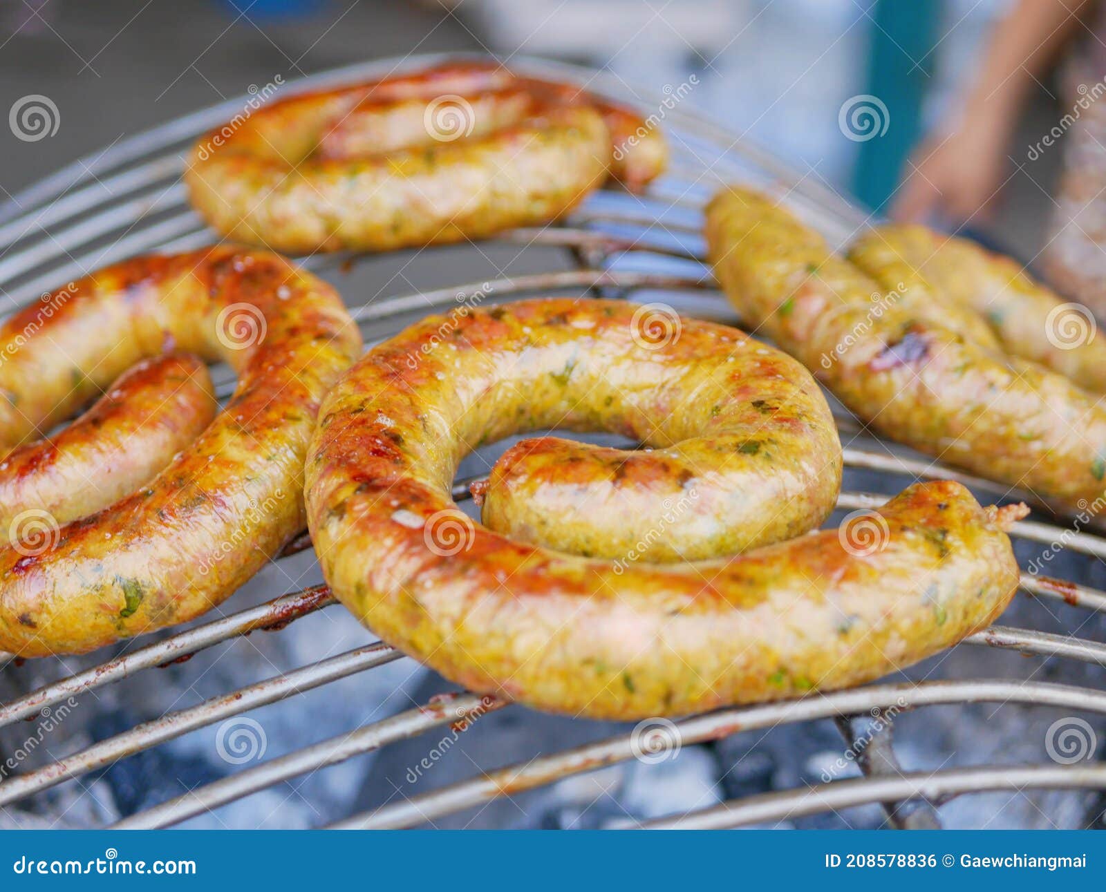 herbal northern thai sausage,sai aua, grilled on a hot charcoal stove