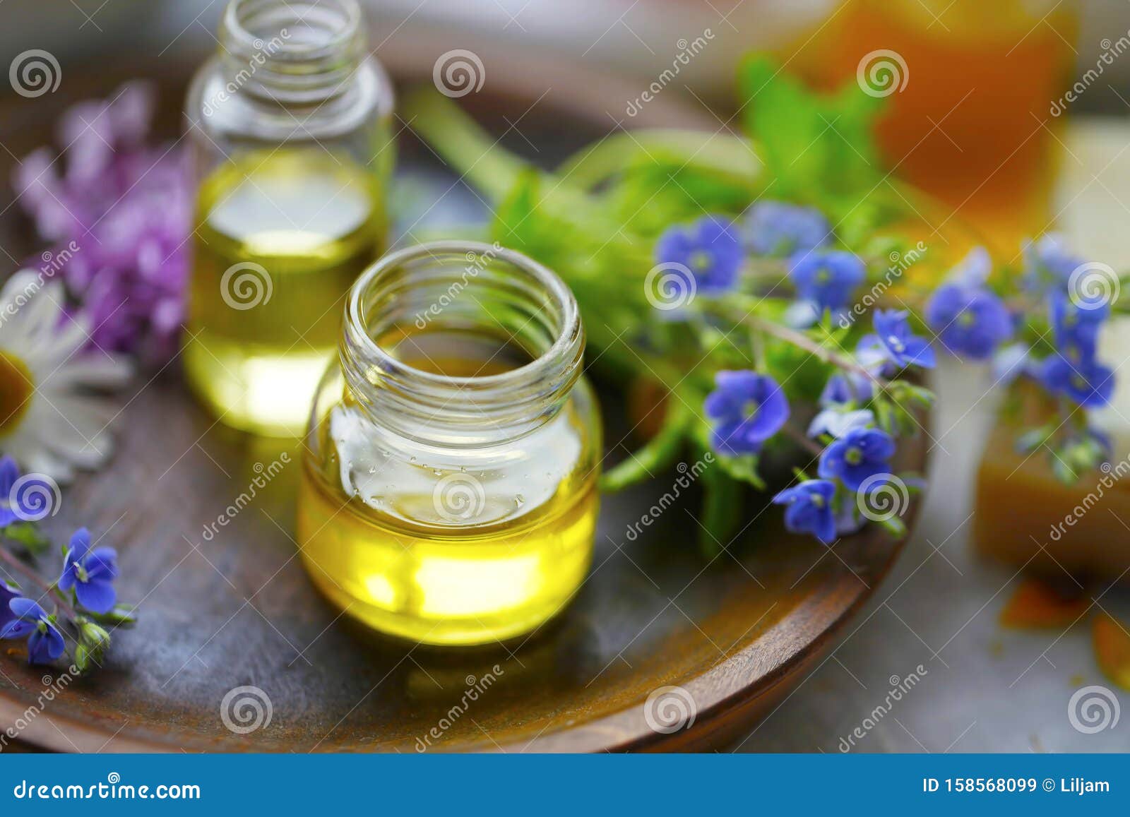 herbal plants oils, alternative herbal medicine, oil bottles