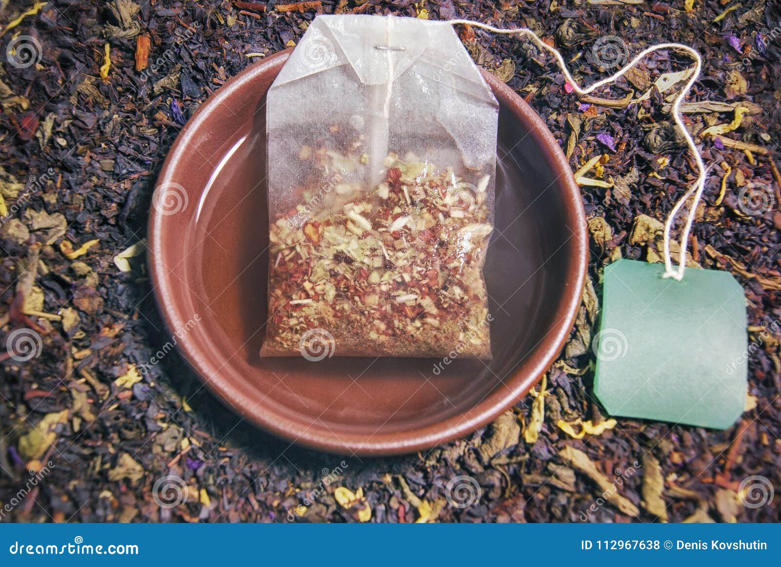 Herbal Tea in a Cup of Brewed Tea Bag Closeup Composition and Re Stock