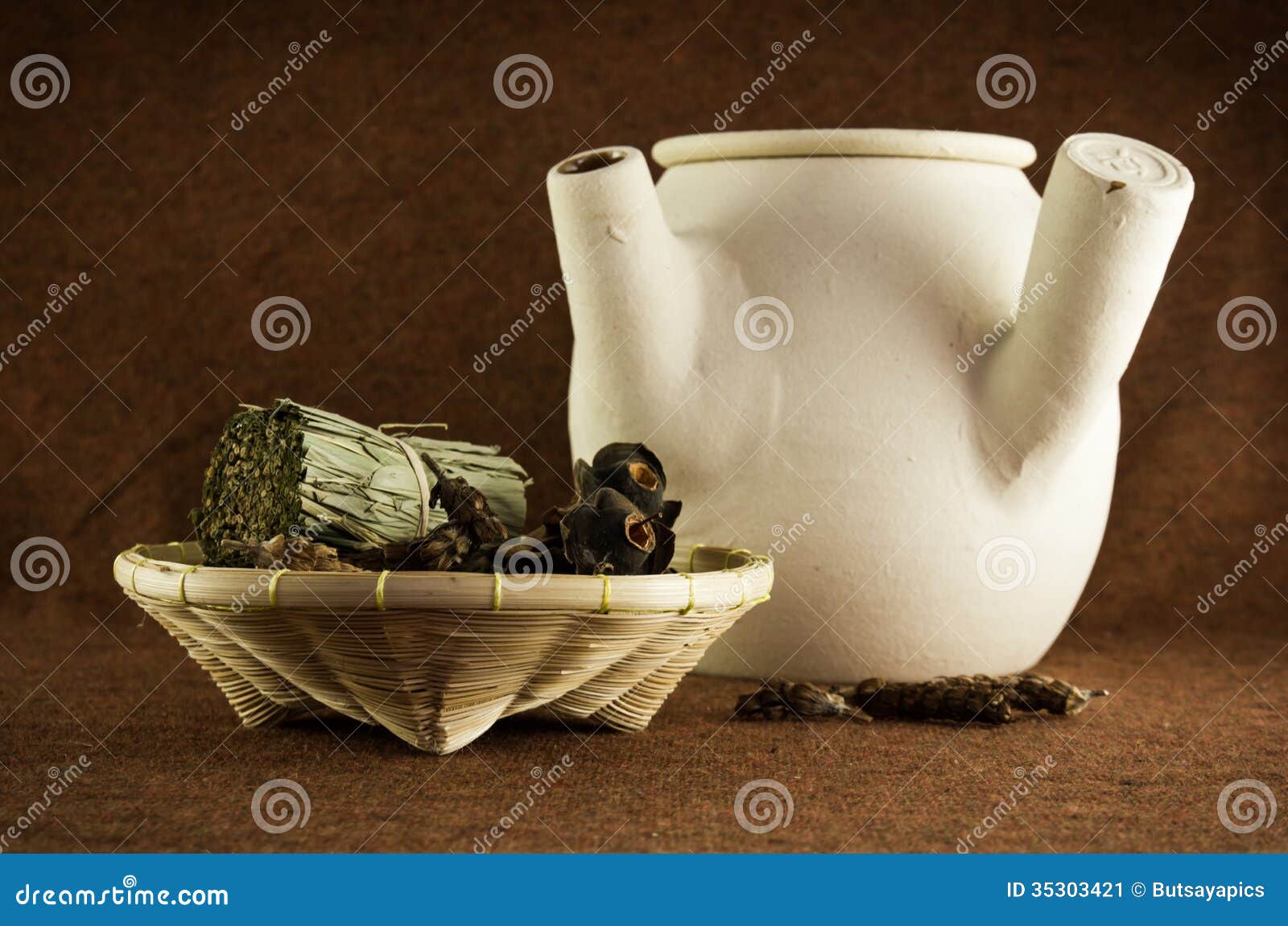 Herbs and chinese clay pot stock image. Image of craft 35303421