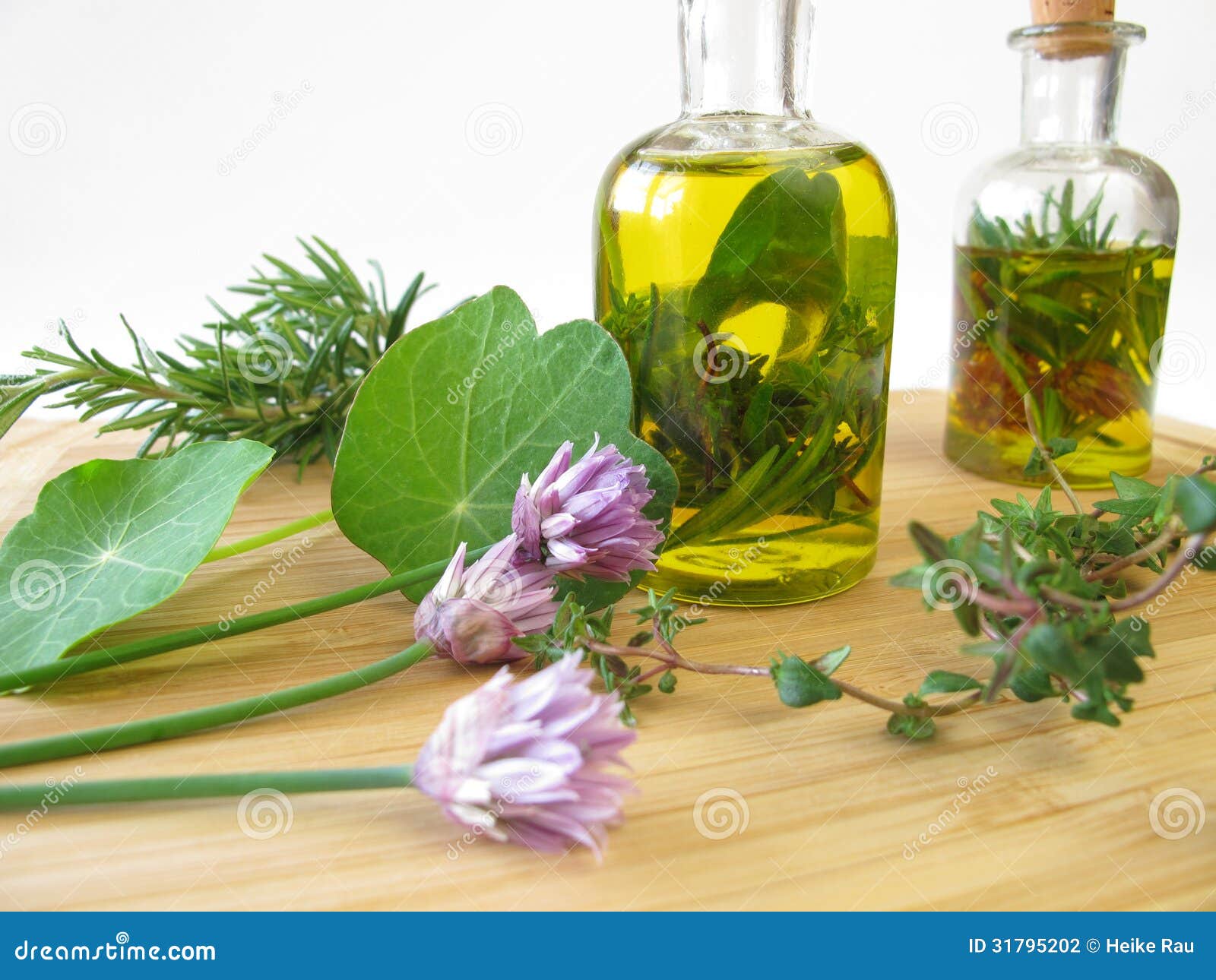Herbs in olive oil stock photo. Image of garden, chives 31795202