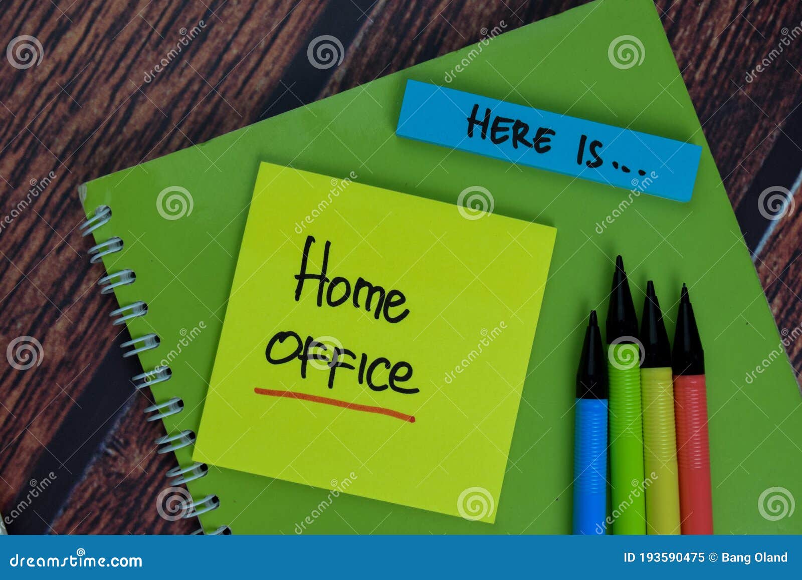 Here is, Home Office Text on Sticky Notes with Office Desk Stock Image