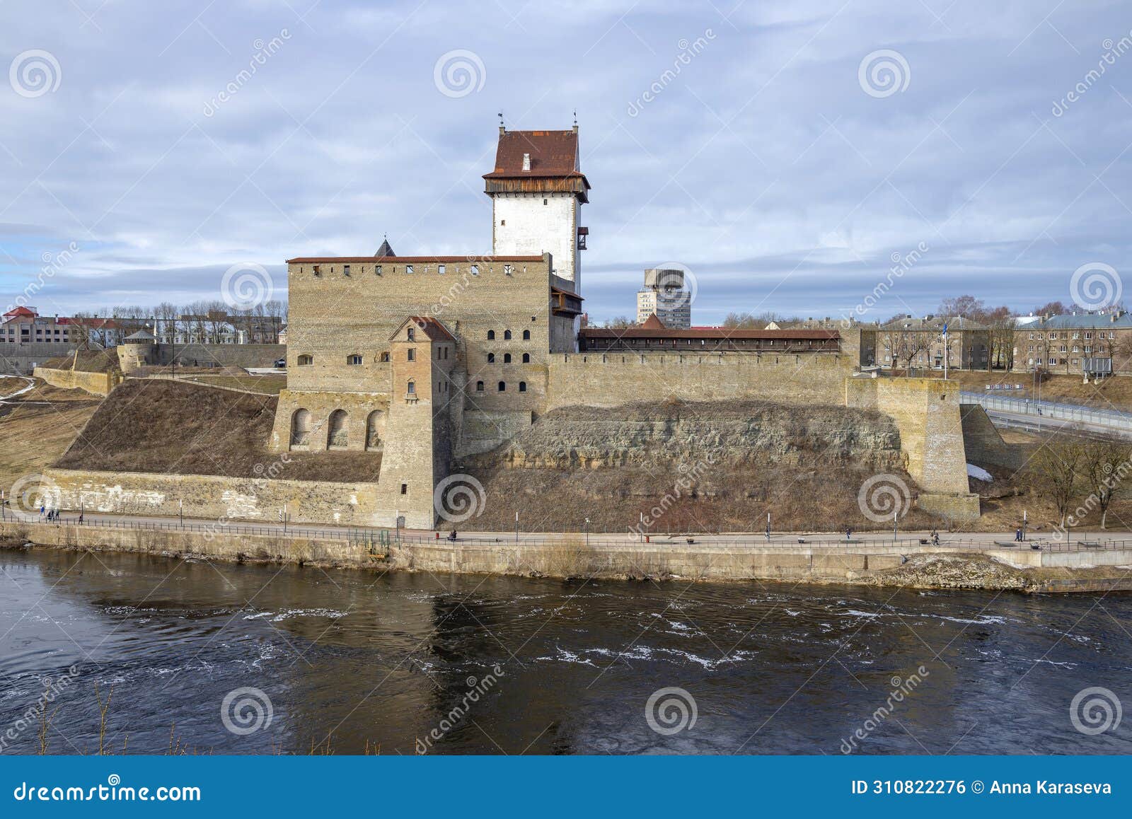 herman's ancient castle on the river bank. narva, estonia