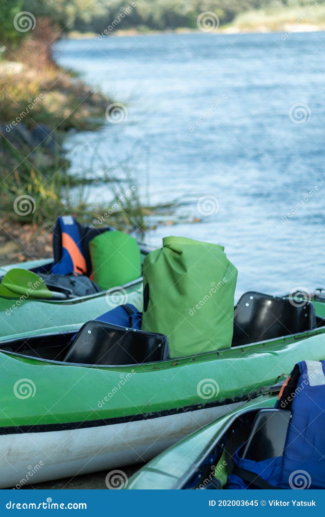 Hermetic Bags in the Boat. Life Jackets and Sealed Bags Stock Image