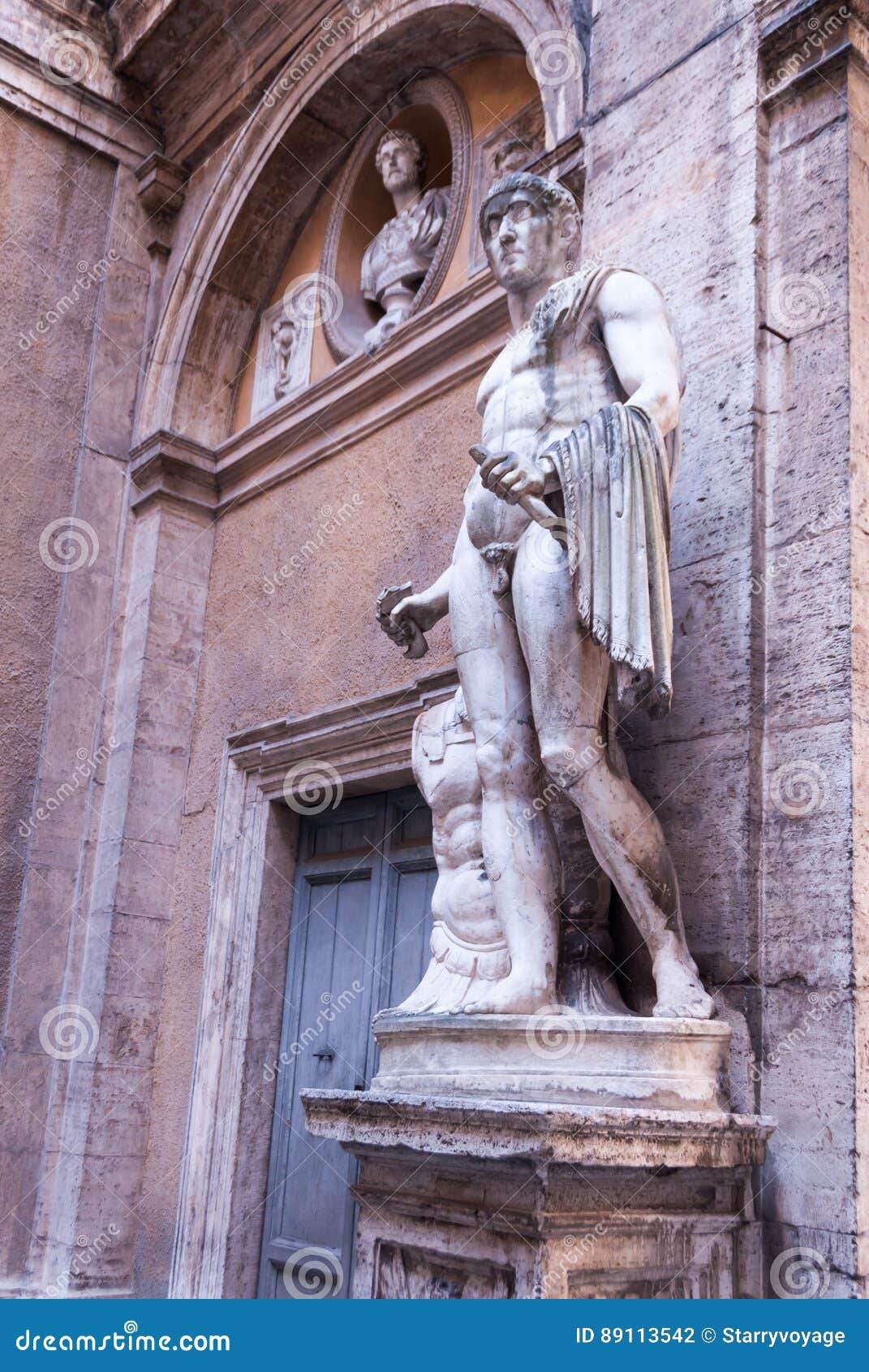 heroic romanesque statue in the ancient palazzo mattei di giove courtyar