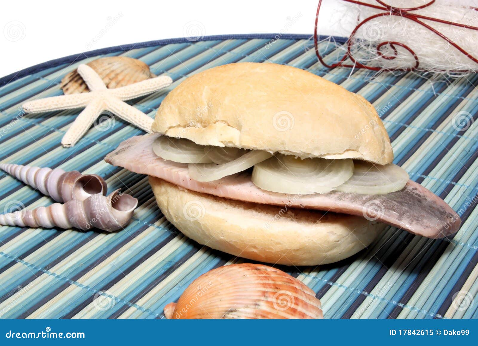 Herring bun with onion rings