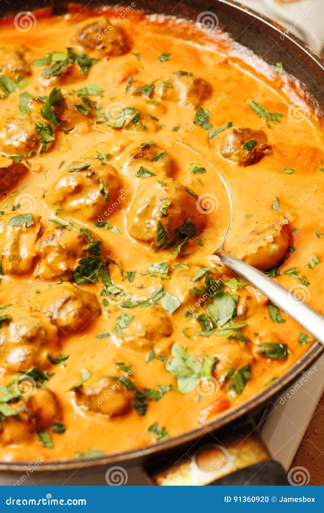 Herring Fish Balls in Tomato and Coconut Milk Sauce Stock Photo Image