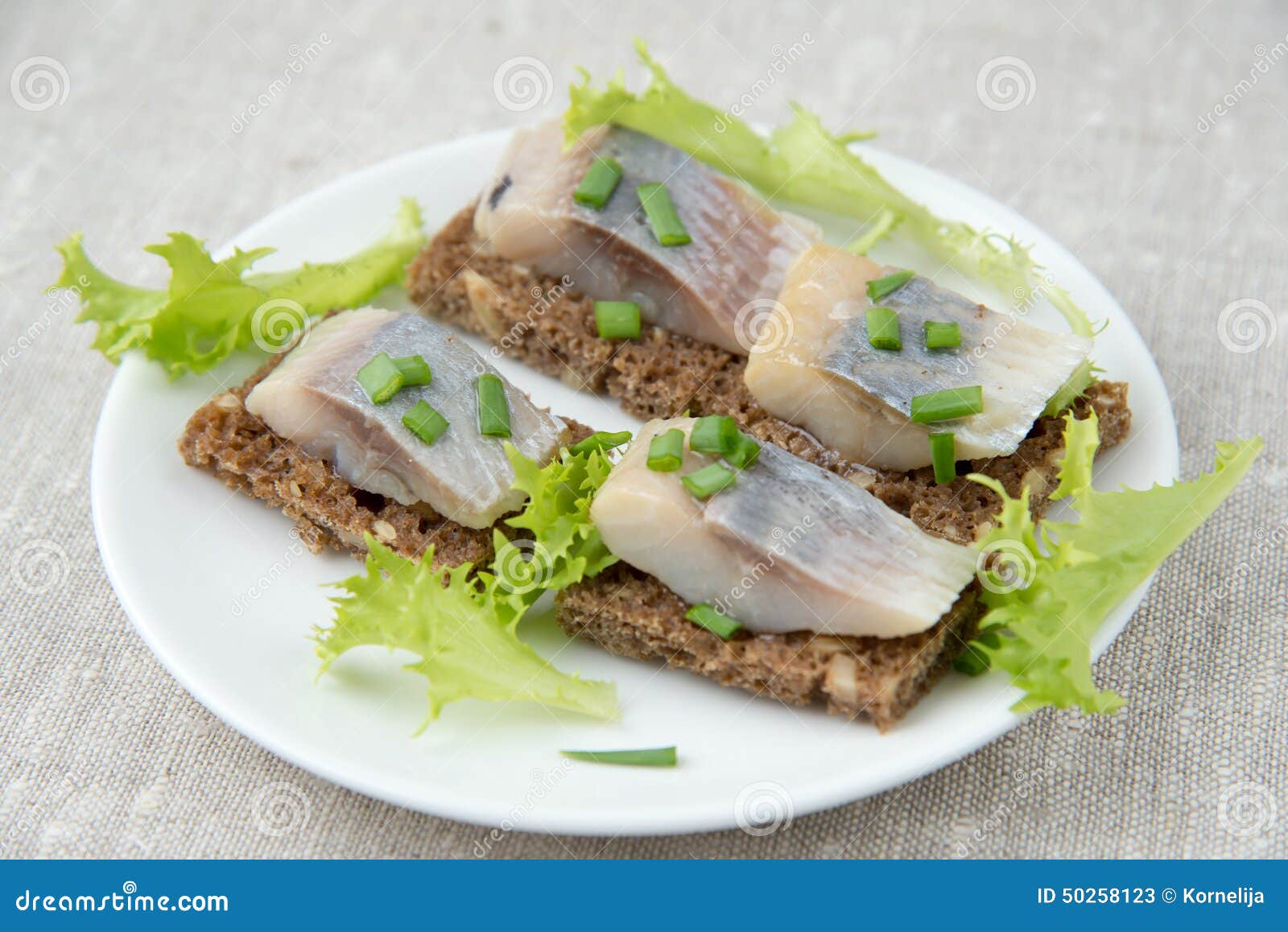 Herring sandwiches stock image. Image of salad, alternatives 50258123