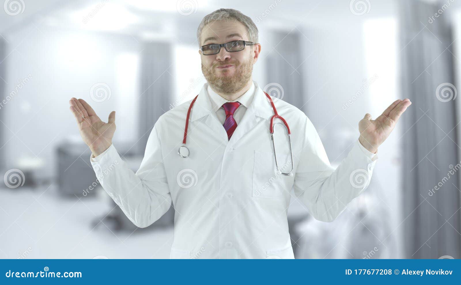 incompetent doctor spreads his hands in the modern hospital ward