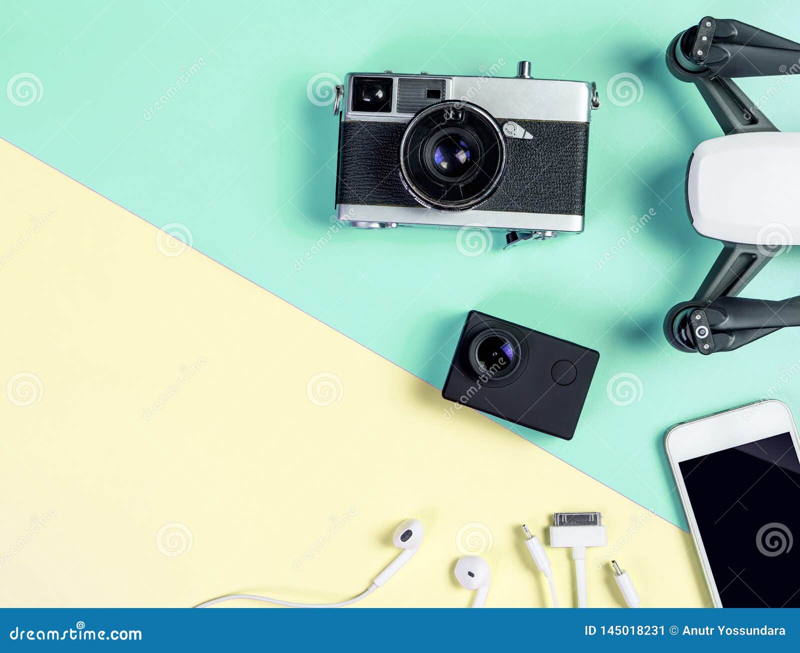 Hi Tech Travel Gadget Accessories on Blue and Pink Copy Space Stock