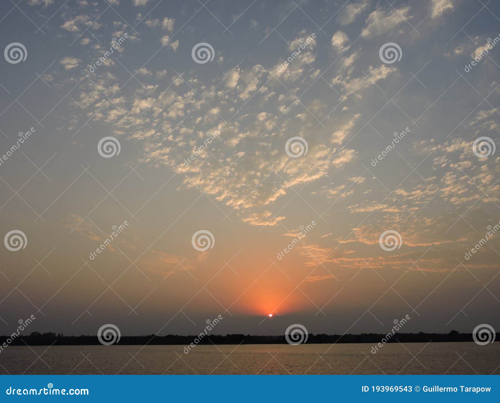 hidrovia paraguay paranÃÂ¡ rayos sol entre las nubes. sunset at de water way paraguay parana