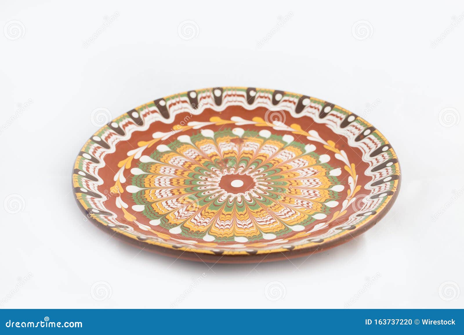 Download High Angle Shot Of A Ceramic Plate With Beautiful Patterns Isolated On A White Background Stock Photo Image Of Closeup Background 163737220 Yellowimages Mockups