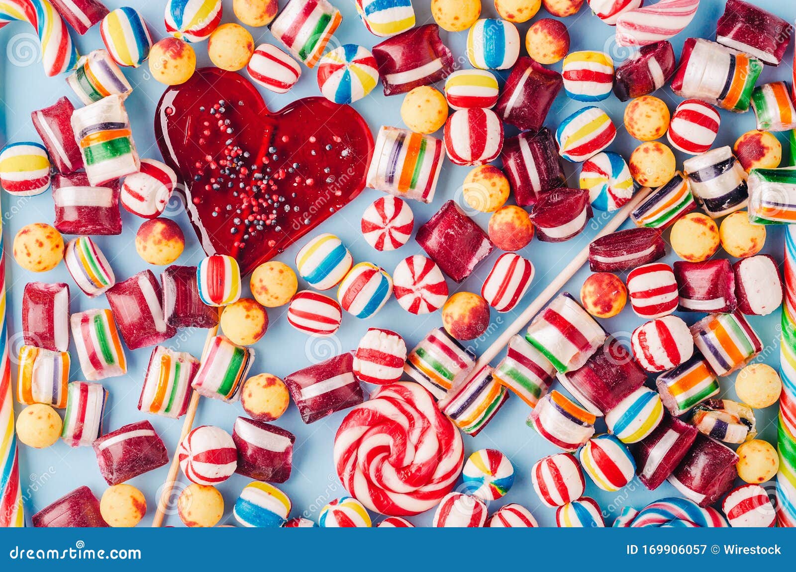 High Angle Shot of Colorful Candies and a Heart-shaped Lollipop - Perfect  for a Cool Wallpaper Stock Image - Image of delicious, beautiful: 169906057