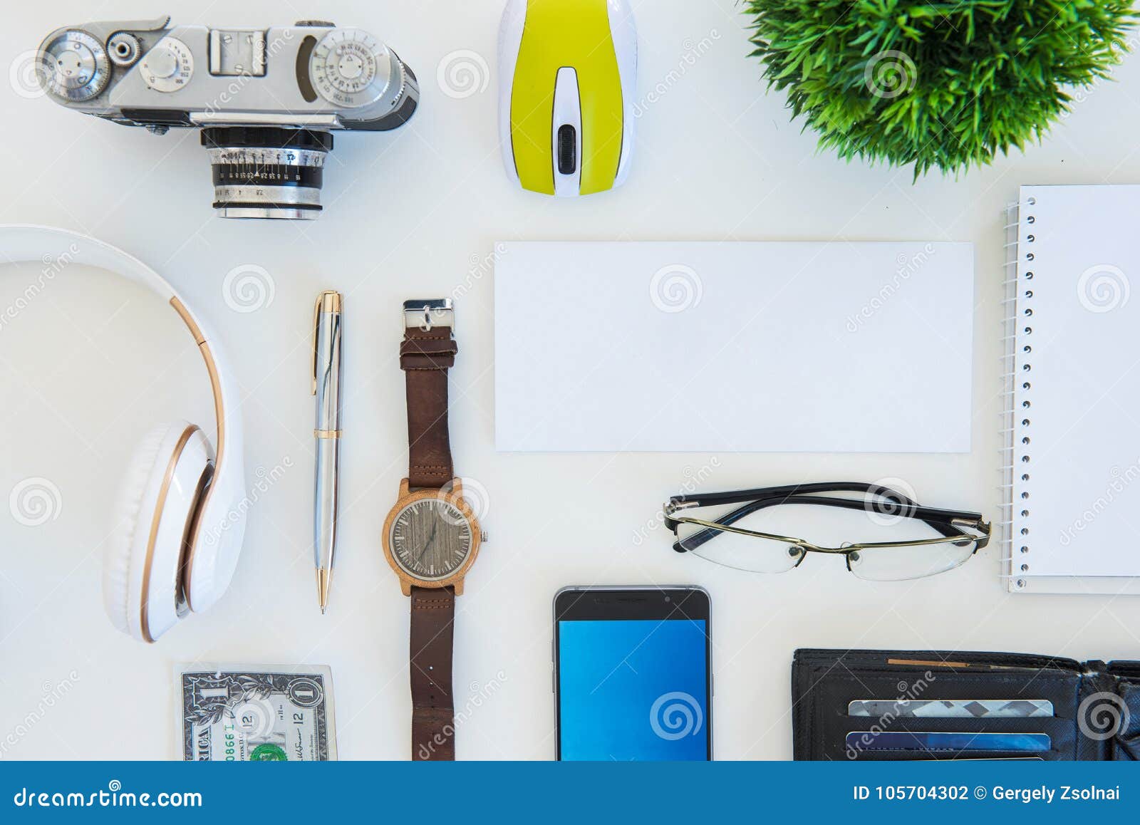 high angle shot of items on a table at an office workstation