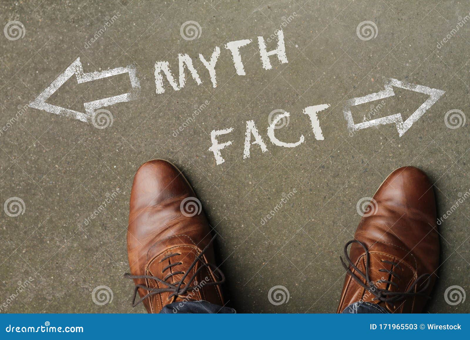 high angle shot of myth and fact marked with opposite directions on the ground