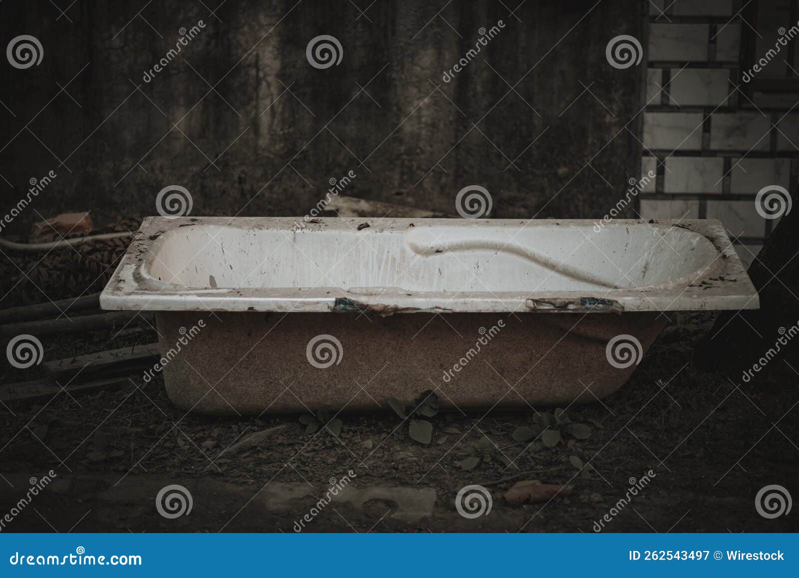 High Angle Shot of an Old Broken Bathtub Thrown in an Abandoned