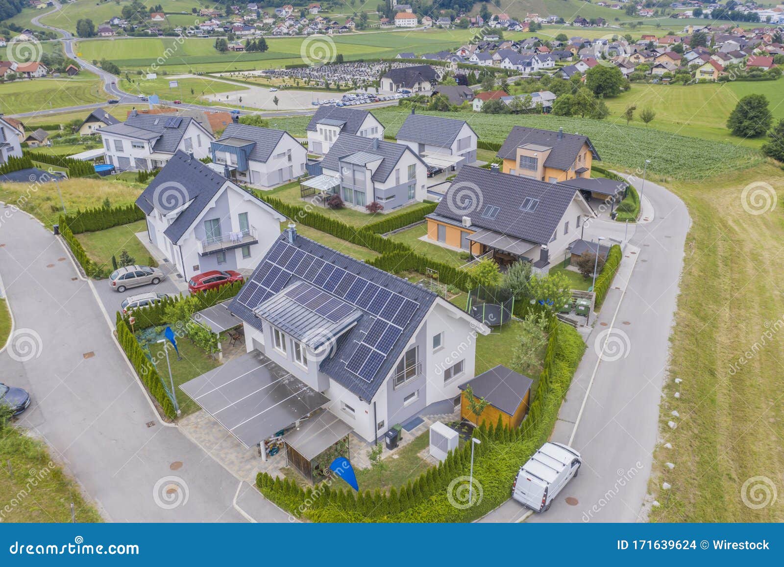 Download High Angle Shot Of Private Houses With Solar Panels On The ...