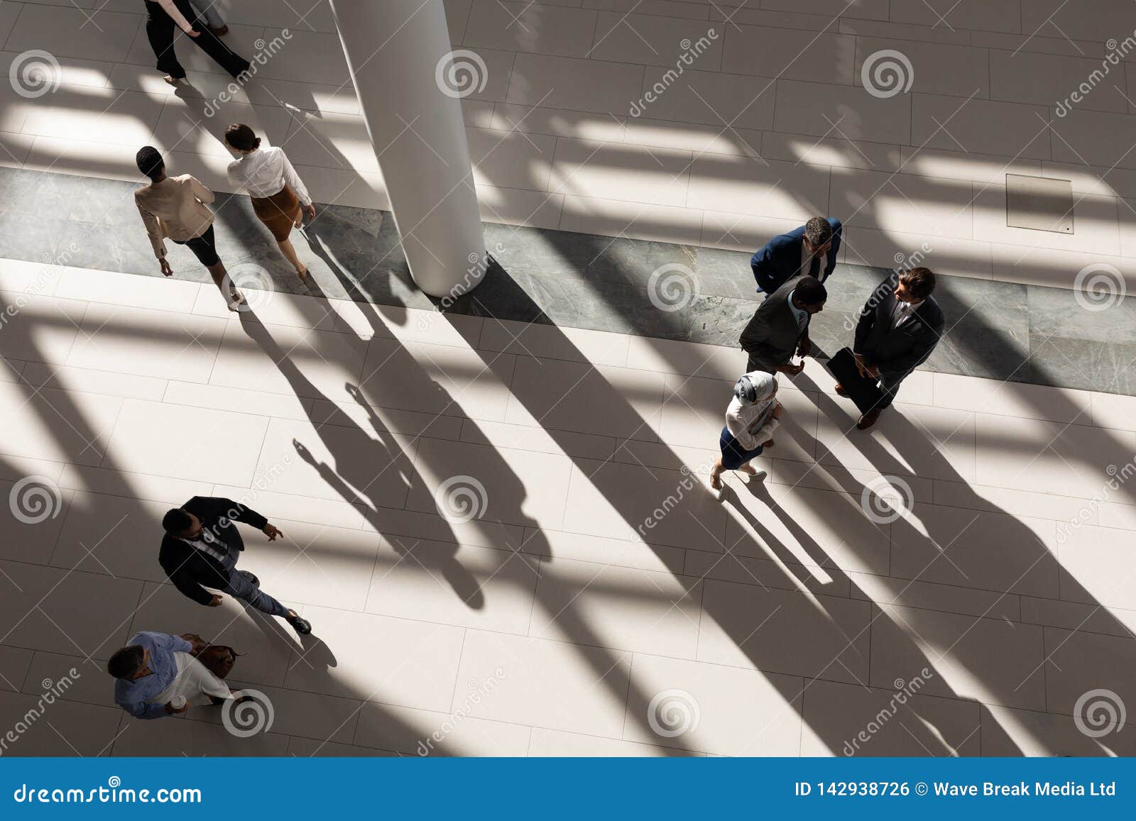 High Angle View of Business Executives in Lobby Stock Photo - Image of