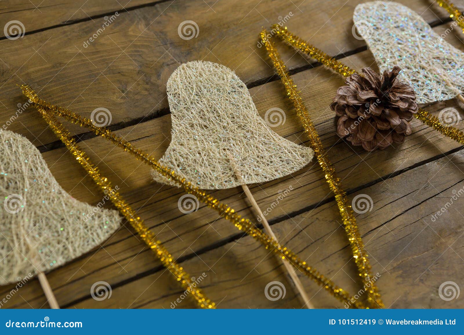 high angle view of glittering sticks and bell  decoration