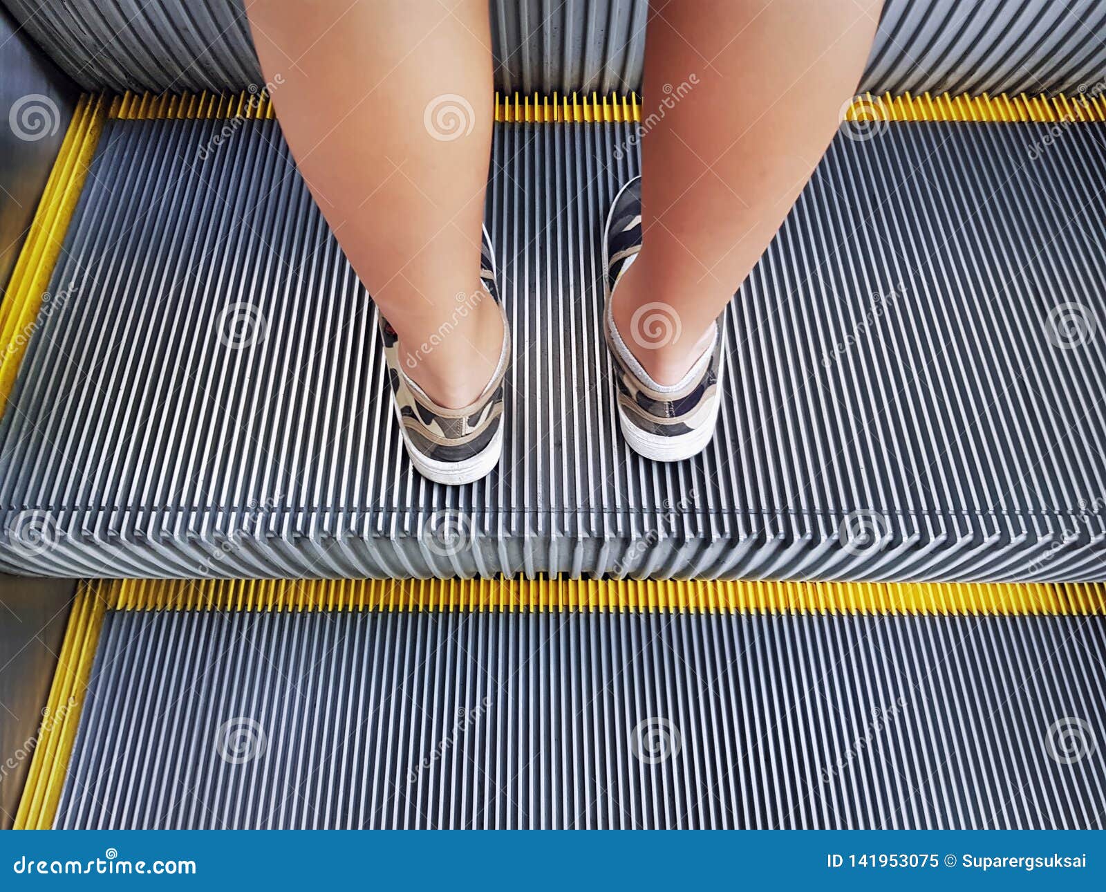 Low Section of Boy Standing on Escalator Stock Image Image of male