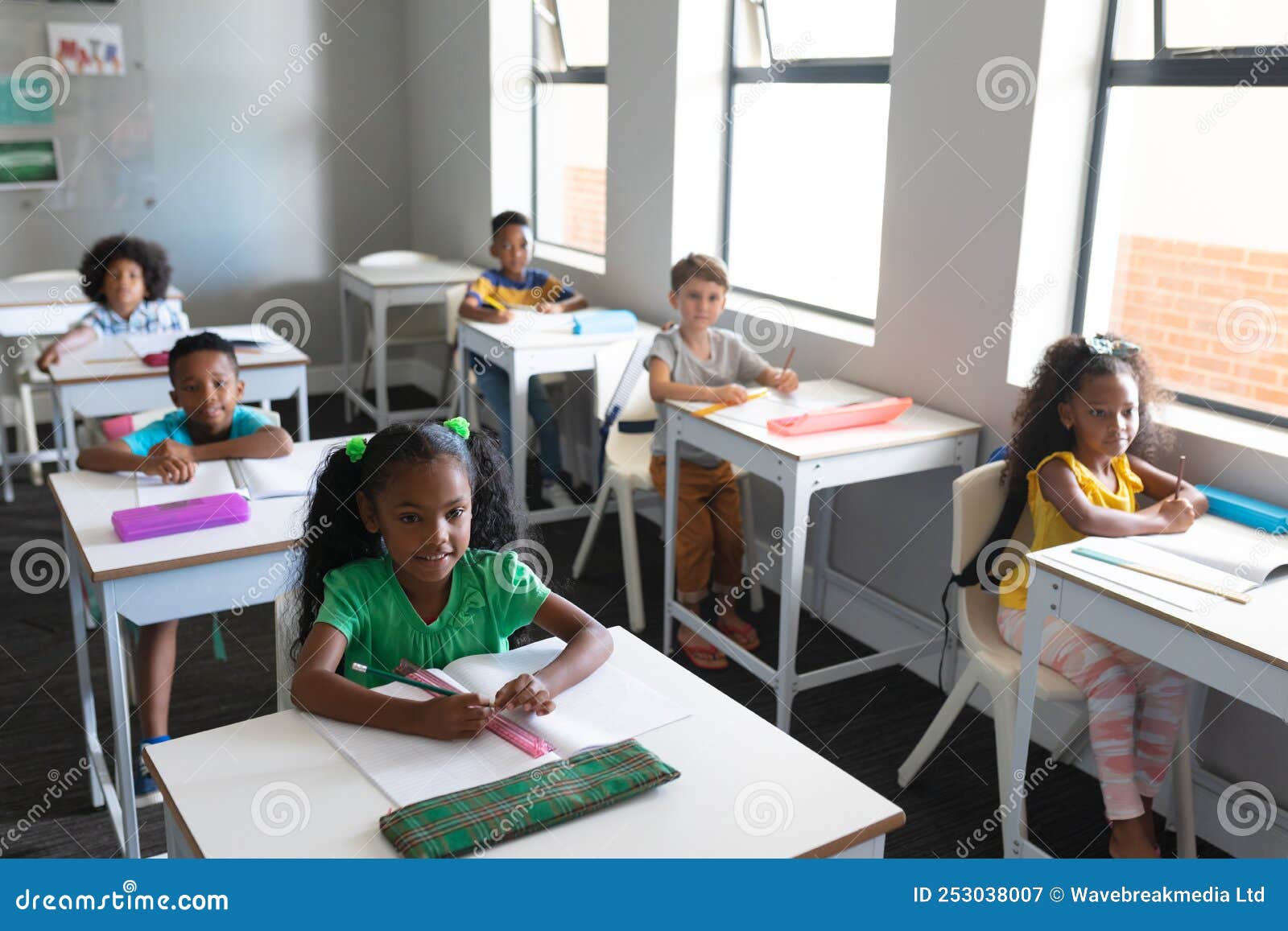 High Angle View of Multiracial Elementary School Students Sitting at