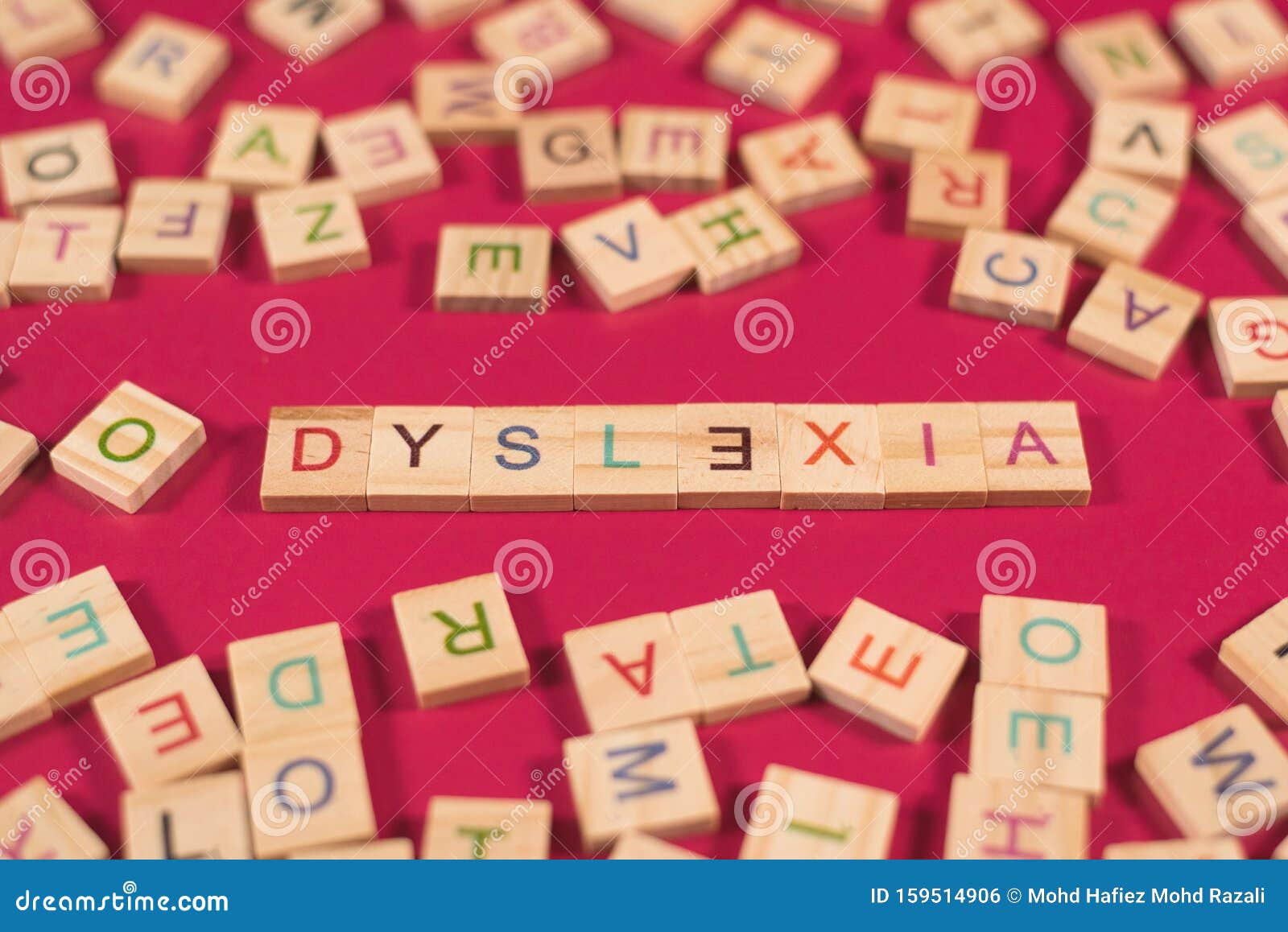 pink wooden alphabet blocks