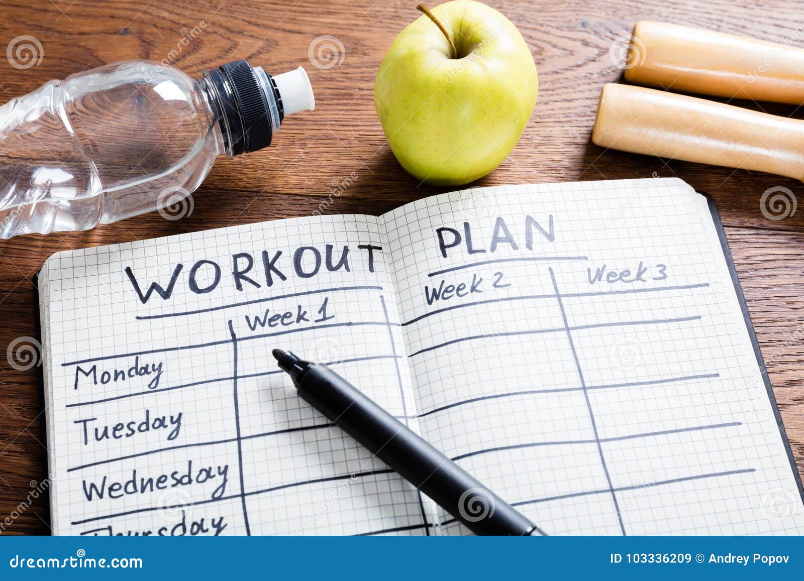 workout plan in notebook