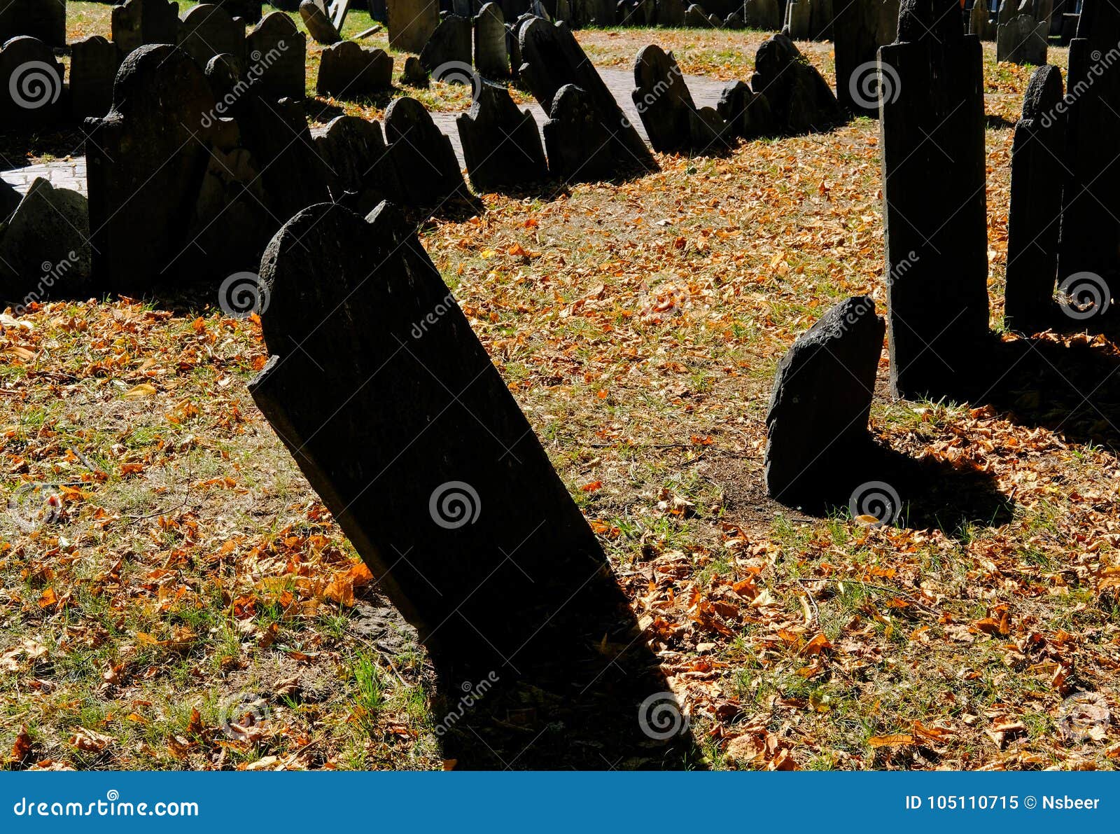 high contrast image of american war of independence graves seen in a famous boston cemetery.
