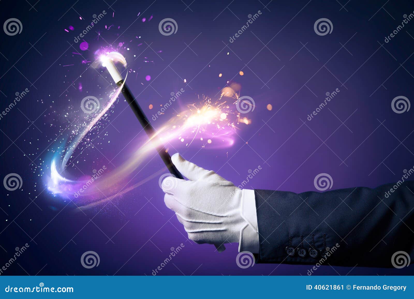 high contrast image of magician hand with magic wand