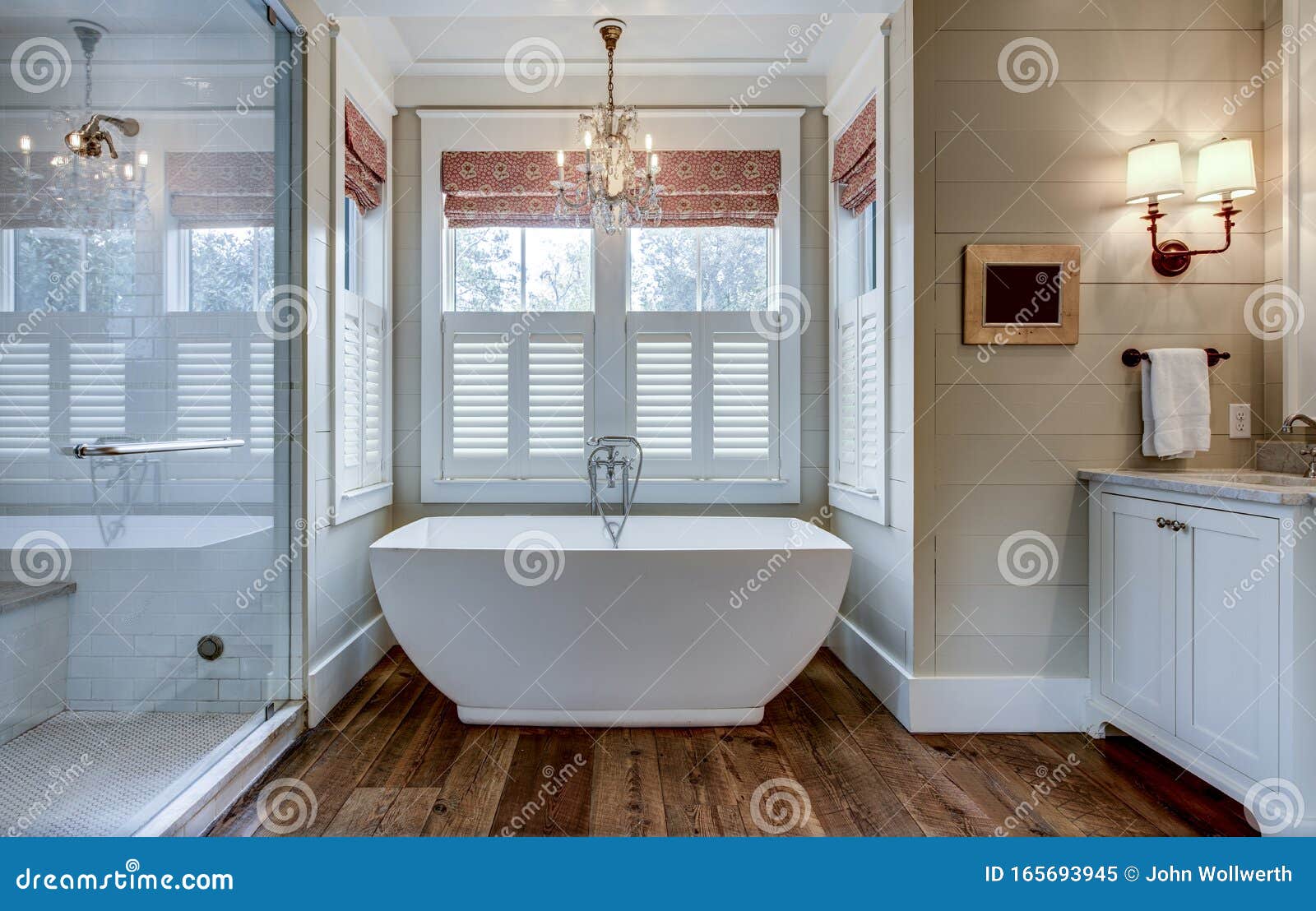 High End Bathroom with Large White Bathtub and Shiplap Siding Stock