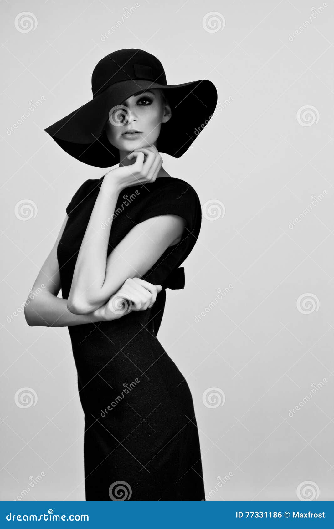 High Fashion Portrait of Elegant Woman in Black and White Hat an Stock ...