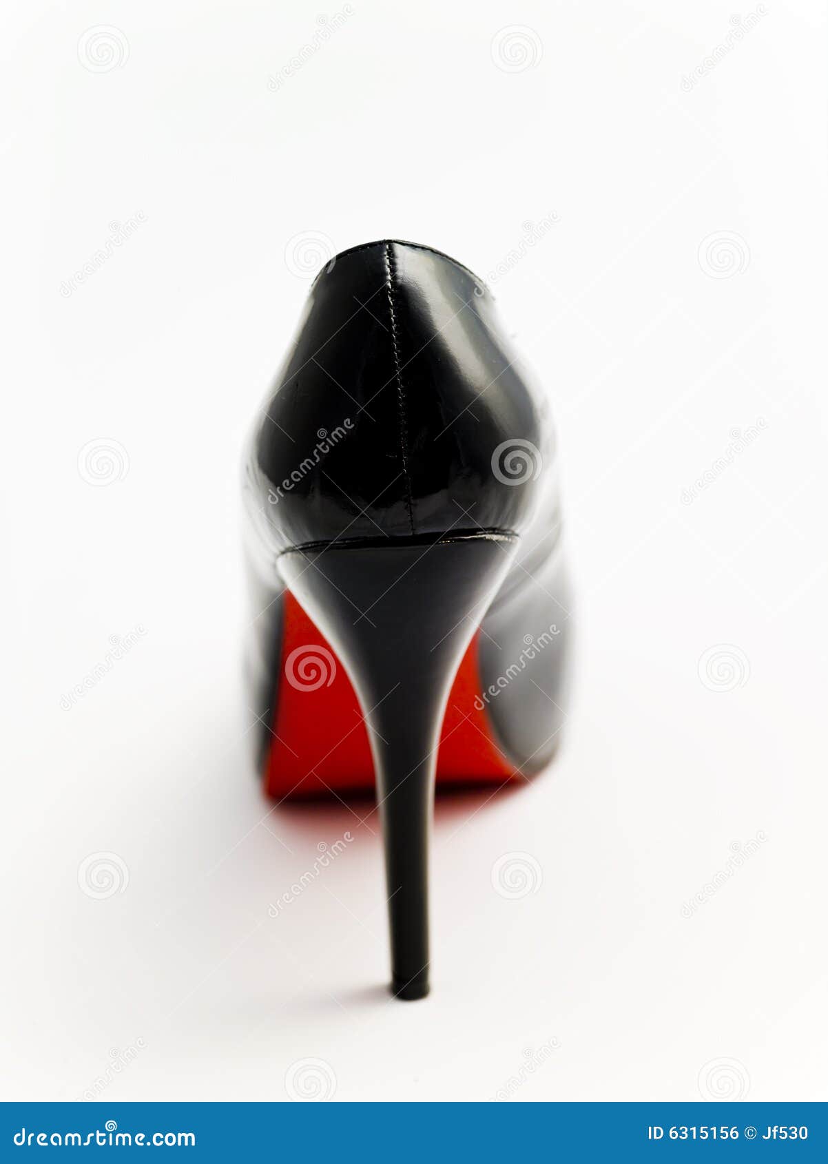 White Shoes With A Red Sole On The Foot Of The Bed, Close-up Stock Photo,  Picture and Royalty Free Image. Image 126064281.