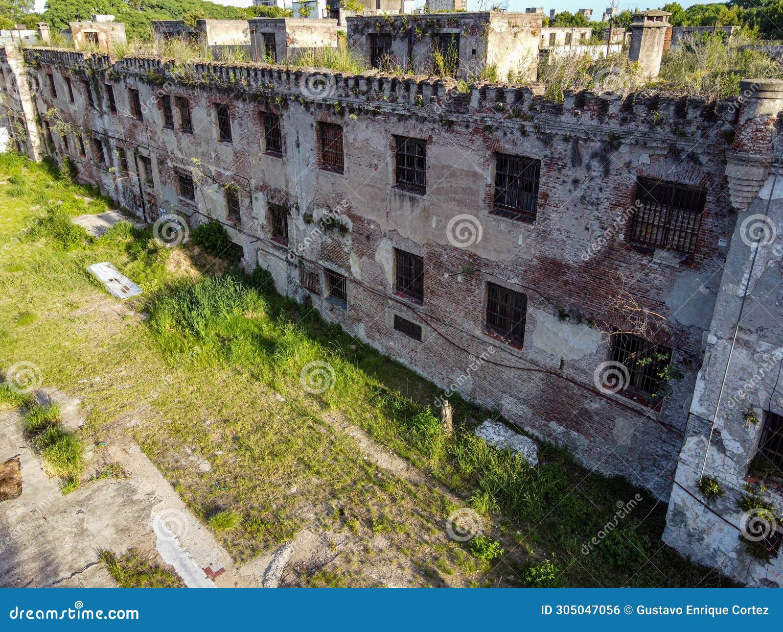high and impassable walls of the abandonate carcel de caseros in parque patricios