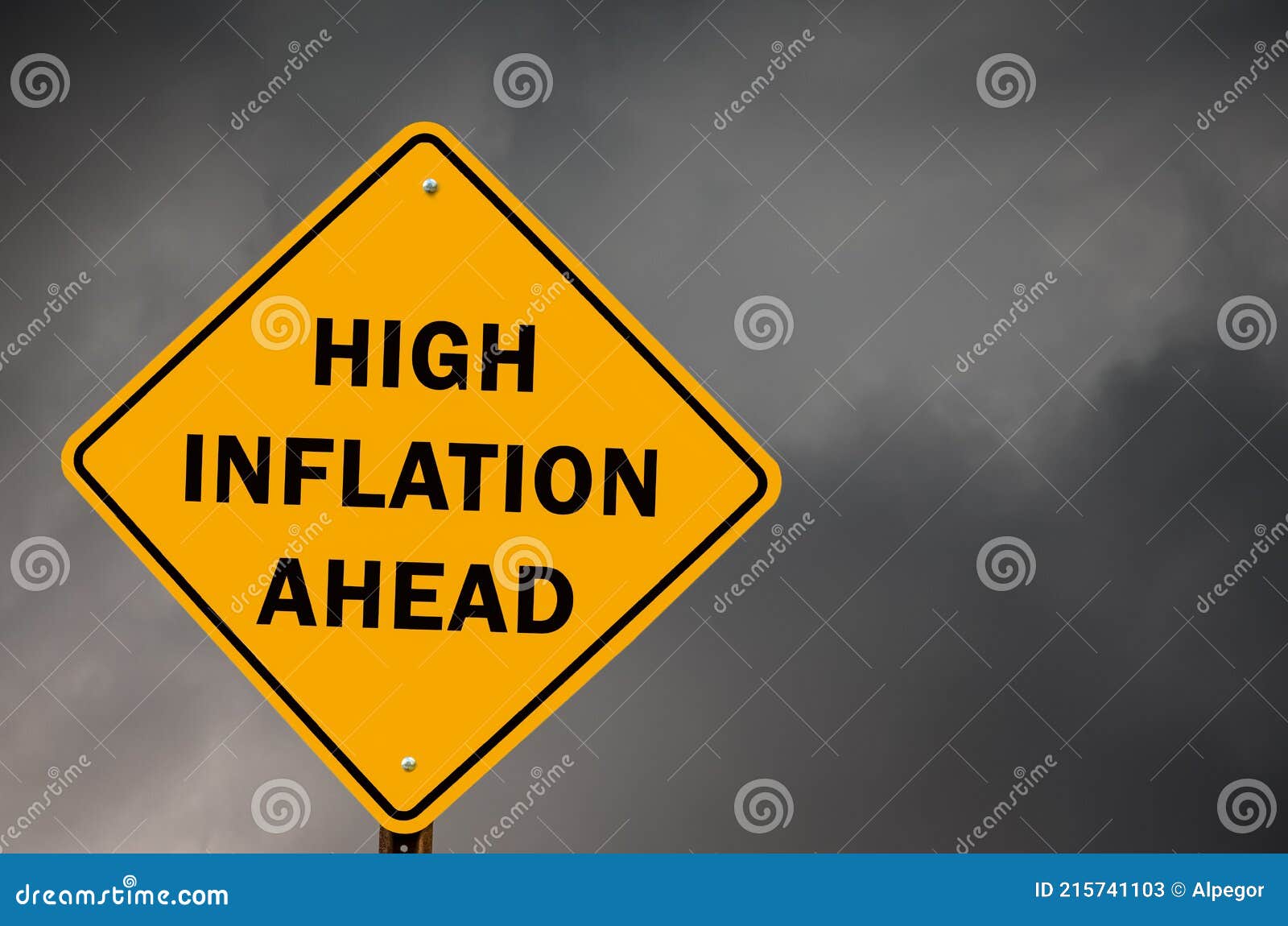 high inflation ahead conceptual traffic sign with stormy sky in background