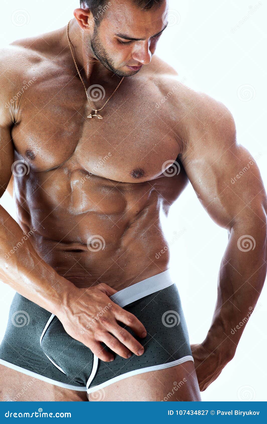 Muscular High Level Bodybuilder Posing Shirtless Stock 