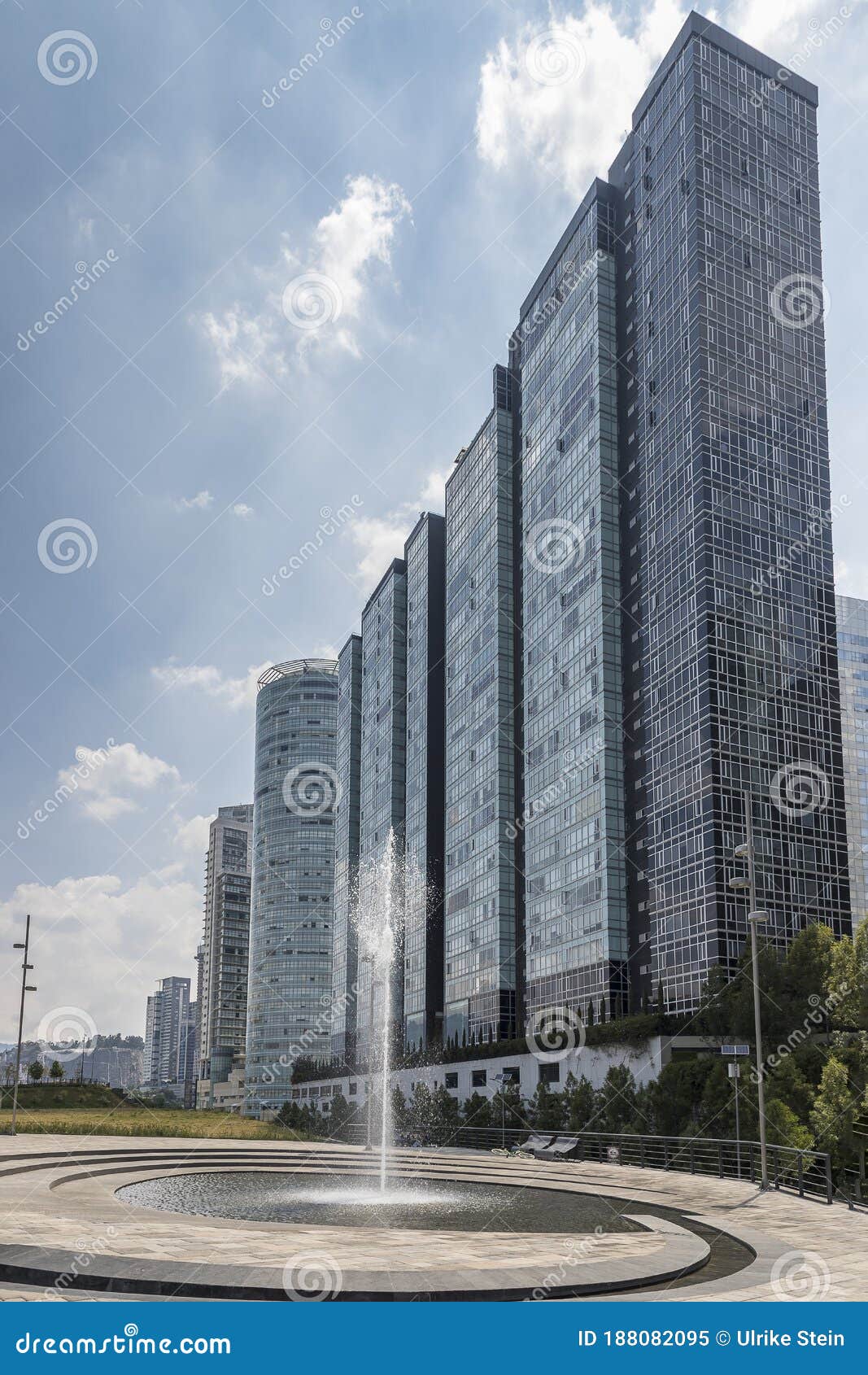 high modern skyscrapers behind a fountain