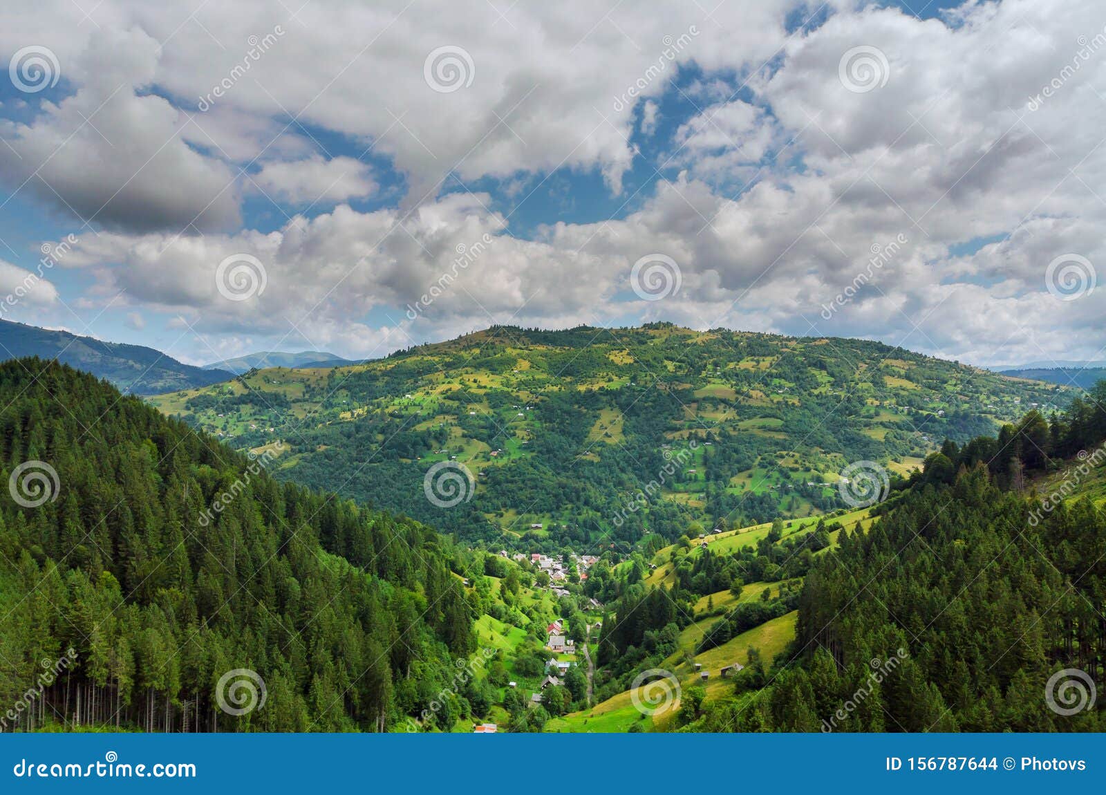 high mountain panorama drone fly above the mountains in summer. aerial view above in the carpathian mountains and meadows