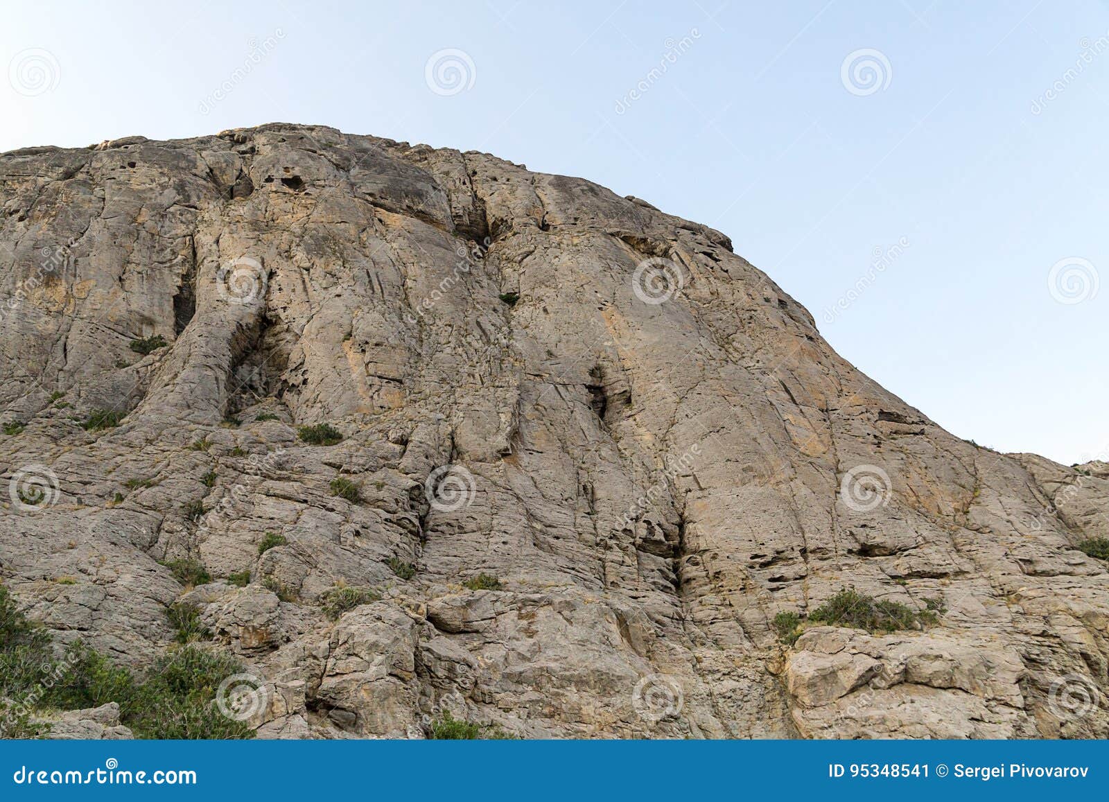 high mountain with smooth walls and uneven top unapproachable
